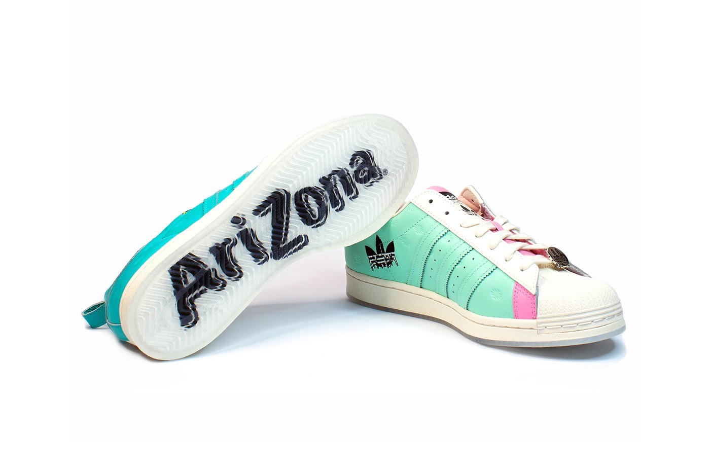 https___hypebeast.com_wp-content_blogs.dir_6_files_2021_01_adidas-originals-arizona-iced-tea-superstar-collaboration-sneakers-big-cans-blue-pink-white-price-release-date-6.jpg