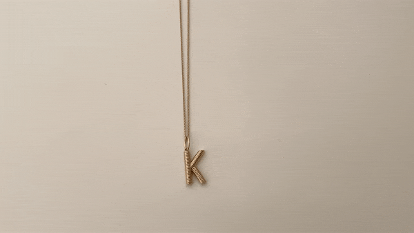 Bold Letter Pendant Necklace 2.gif