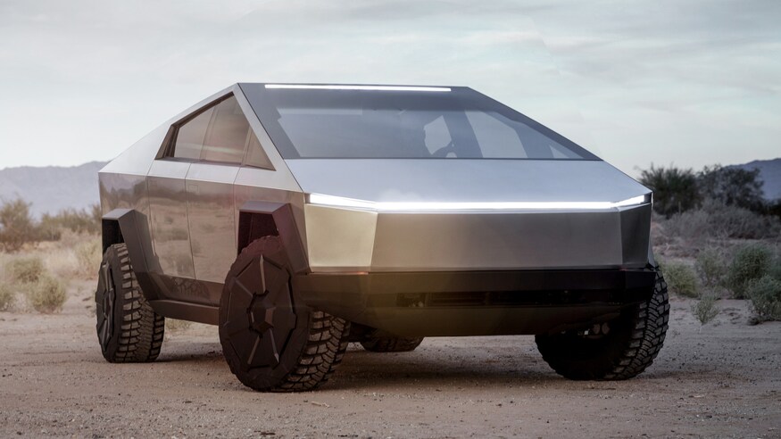 Tesla-Cybertruck-Electric-Pickup-Truck-Front-3-4-View-With-Off-Road-Lights-And-Headlights-Illuminated.jpg